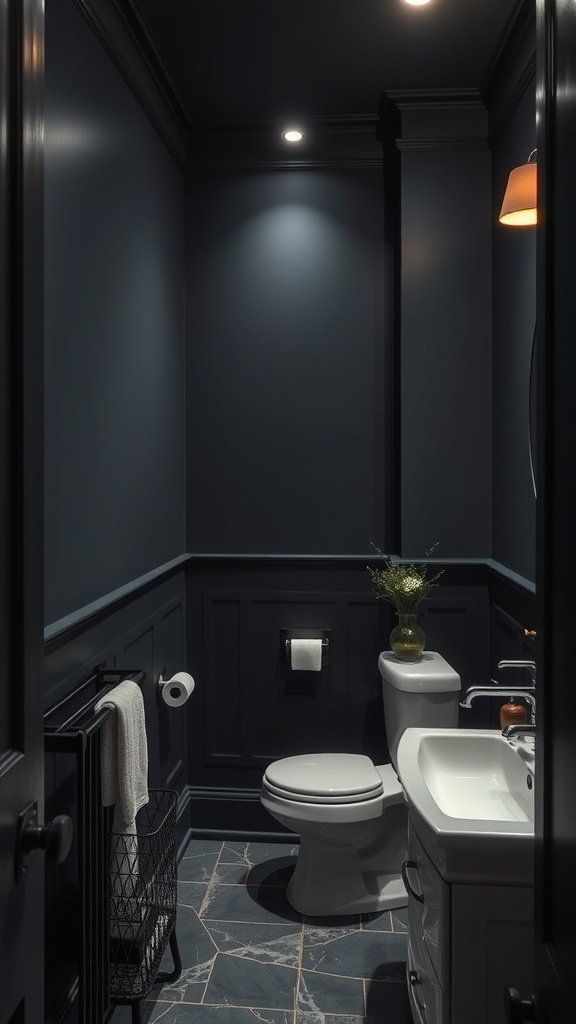 A small bathroom with charcoal-painted walls, showcasing a modern design with white fixtures and subtle lighting.